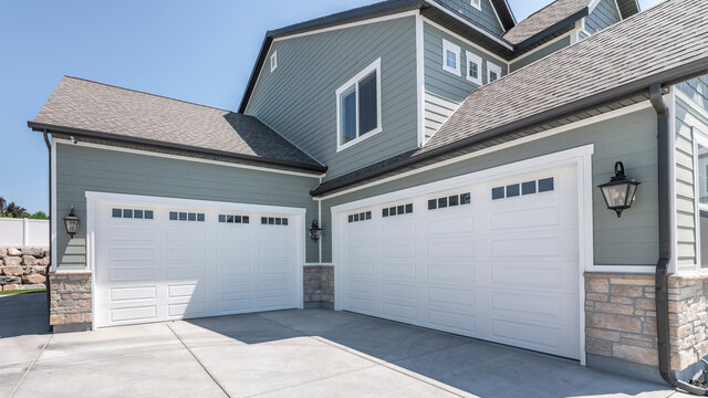 house with 2 garage doors